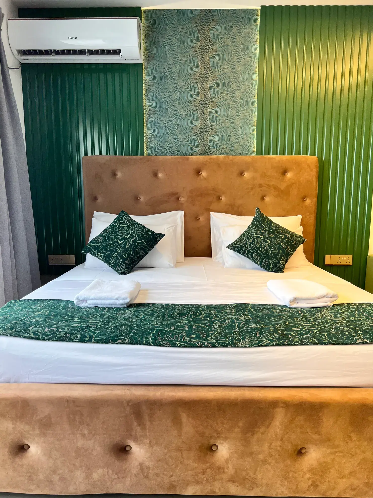 Double bed with an upholstered headboard