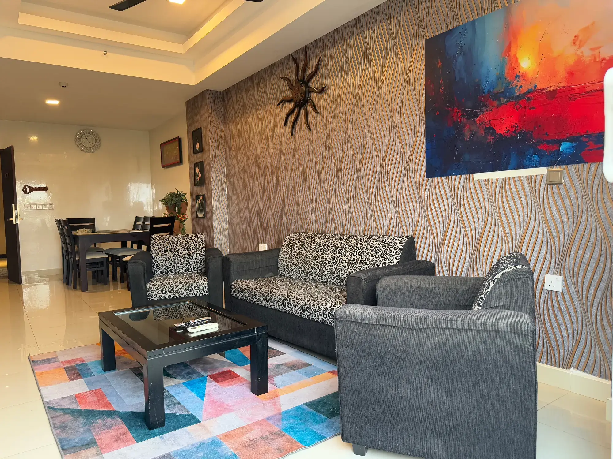 Living room with sofas and a dining table