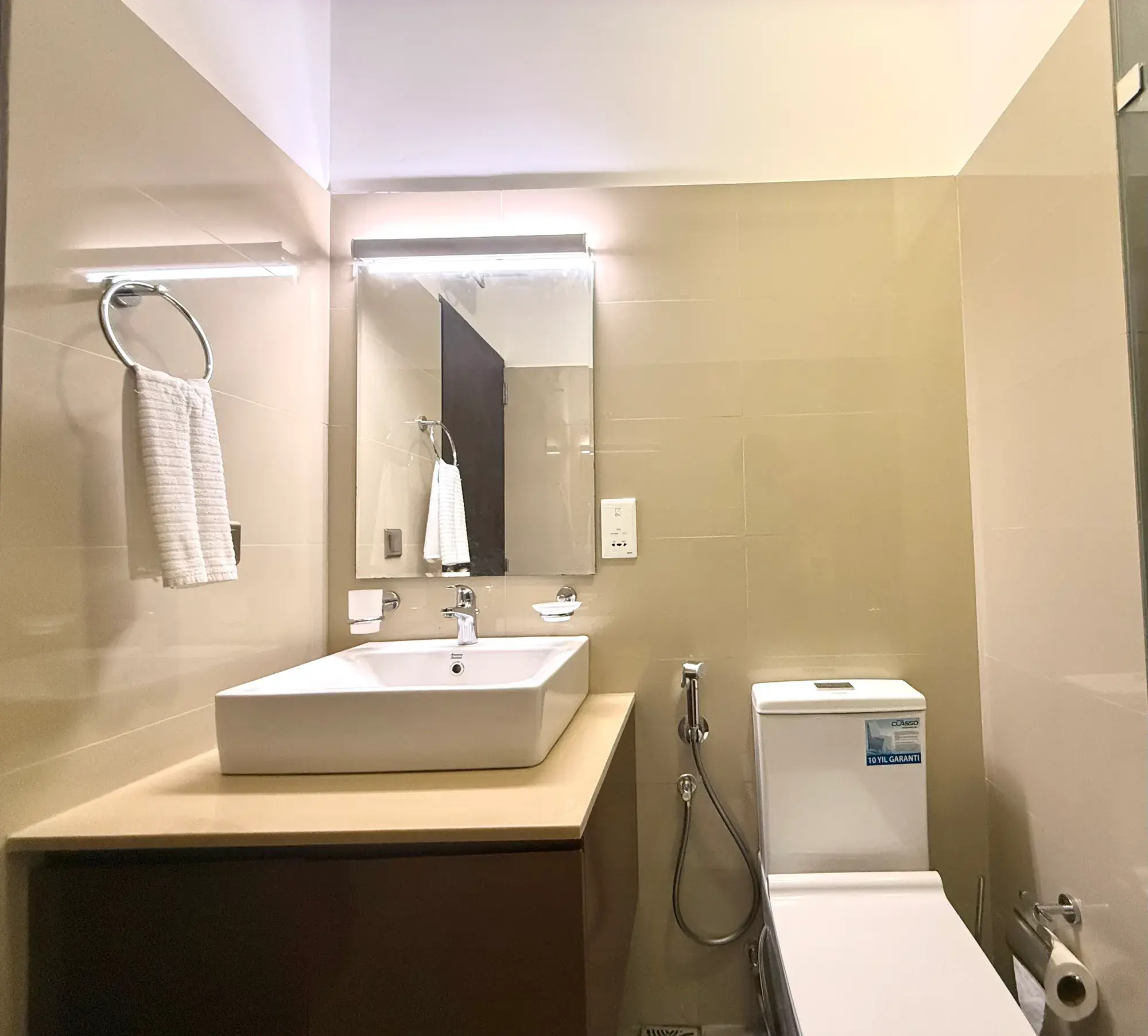 Bathroom with a basin and mirror