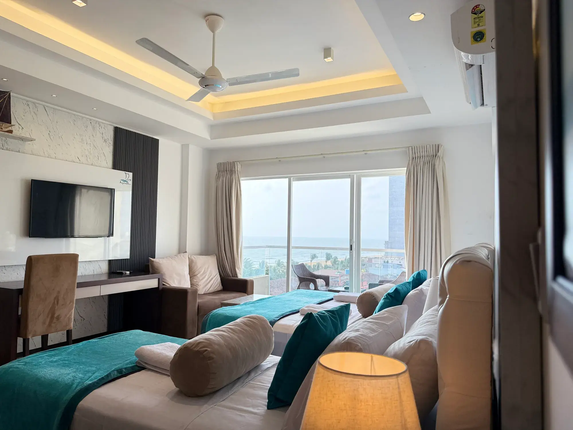 Bed and sofa by the window
