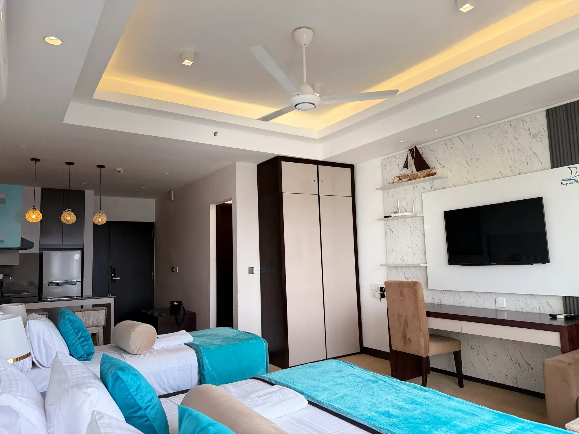 Bedroom with a wall-mounted TV