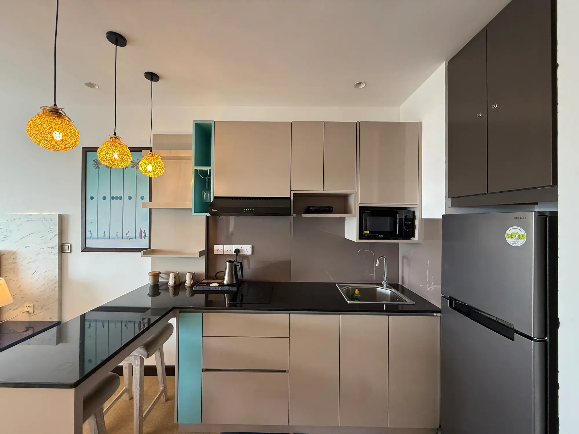 Kitchen with a fridge and microwave