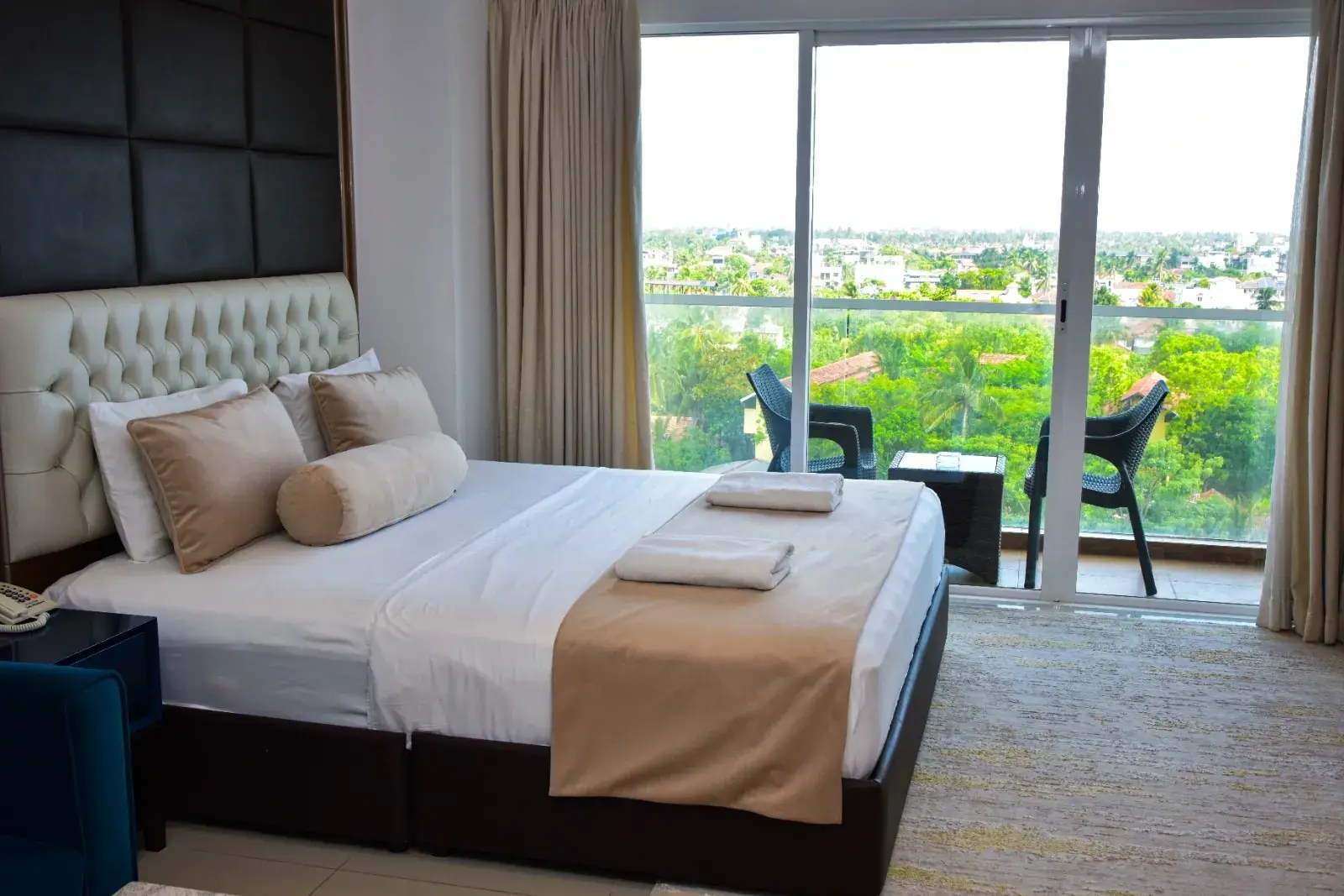 Bed facing the balcony