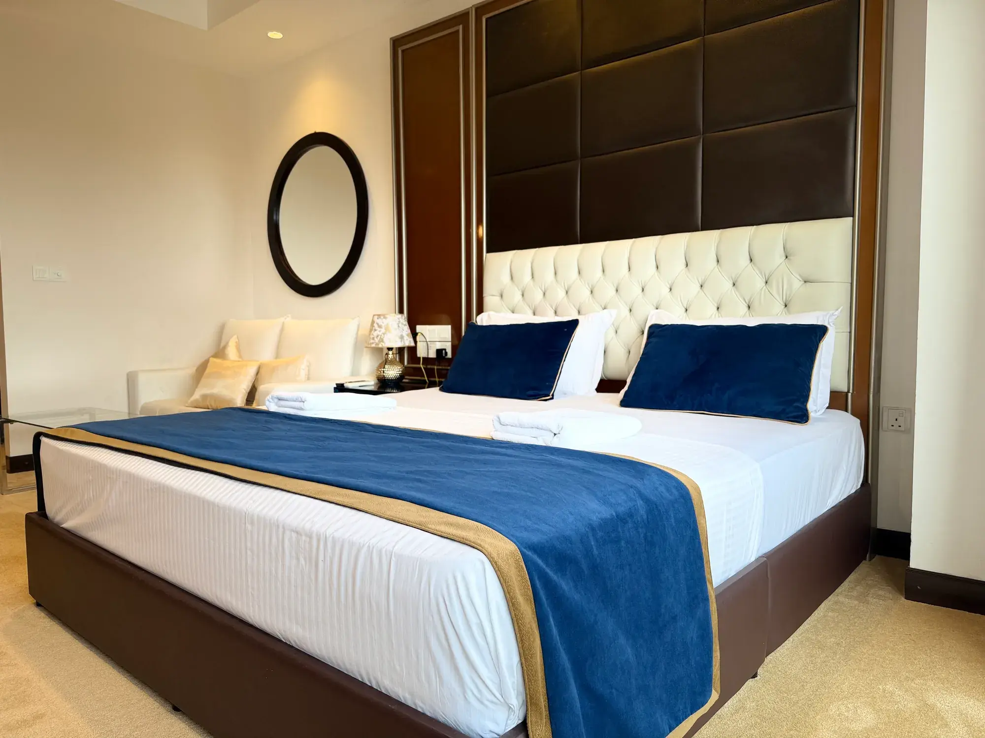 Double bed with a padded headboard