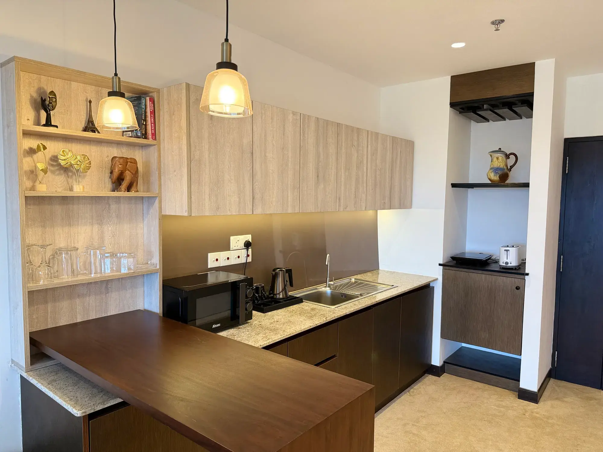 Kitchenette with shelves and a counter
