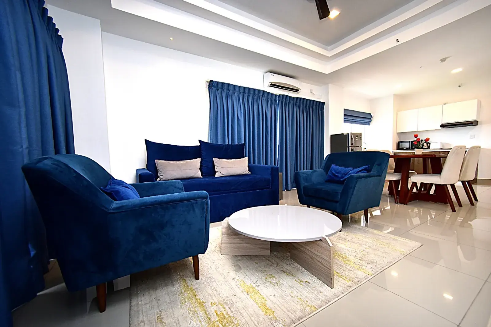 Living room with blue sofas